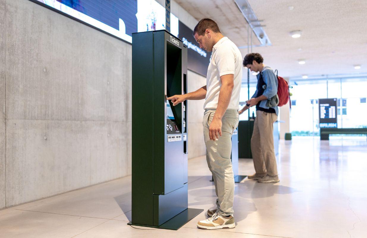 Buying tickets at kiosk